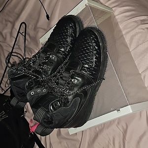 Size 8 in men's, black Nike Air Force winter shoes